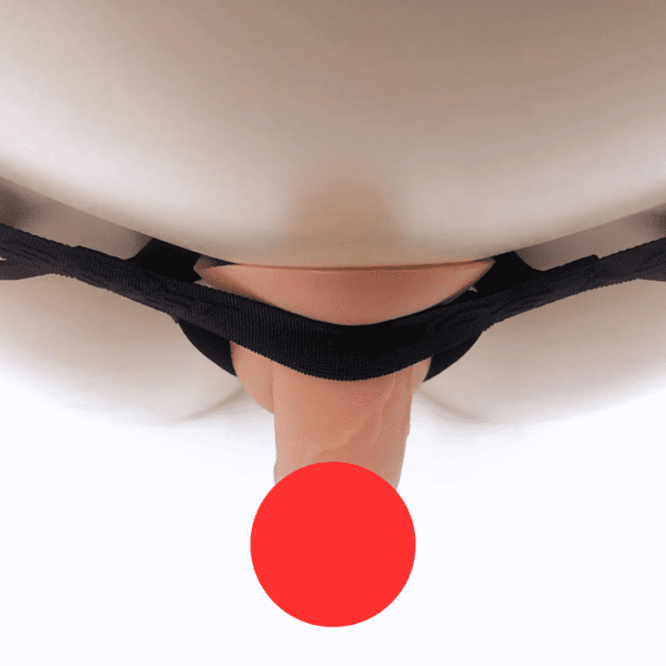 The image shows a close-up view of a Caucasian individual removing or wearing black underwear, with a censorship dot covering part of the genital area for privacy.