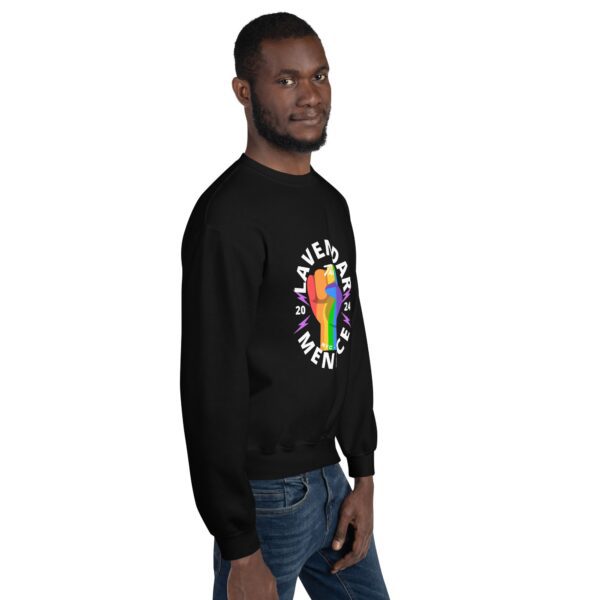 A person wearing a unisex sweatshirt featuring a colorful abstract design and the text "Lavender Menace" stands against a plain background, looking confidently at the camera. They are dressed in jeans, showcasing a casual yet stylish appearance.